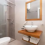 M K